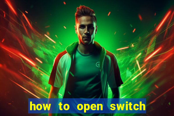 how to open switch oled game card slot