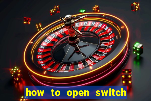 how to open switch oled game card slot